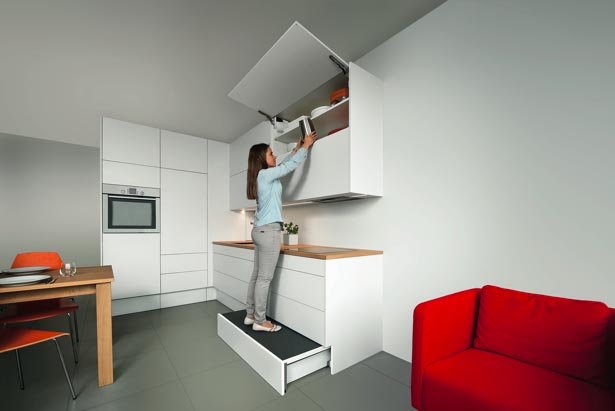 Blum’s plinth pull-out gives you access to top wall cabinet shelves and extra storage space in base units. (Photo: Blum)